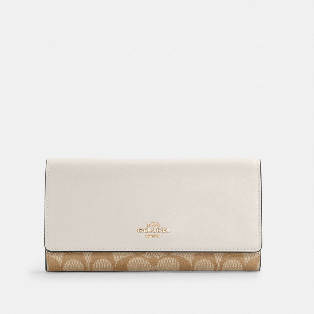 COACH® Outlet Slim Trifold Wallet In Signature Canvas