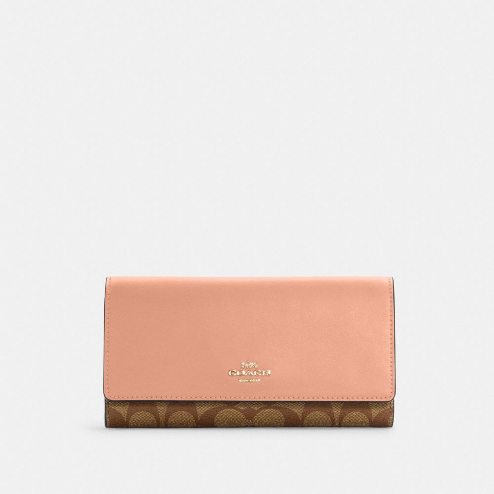 COACH® Outlet Slim Trifold Wallet In Signature Canvas