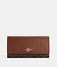 COACH®,SLIM TRIFOLD WALLET IN SIGNATURE CANVAS,pvc,Mini,Im/Brown/Redwood,Front View