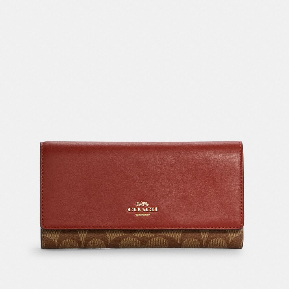 COACH® Outlet Slim Trifold Wallet In Signature Canvas