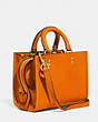 COACH®,ROGUE 17 IN ORIGINAL NATURAL LEATHER,Original Natural Leather,Brass/Carrot,Angle View