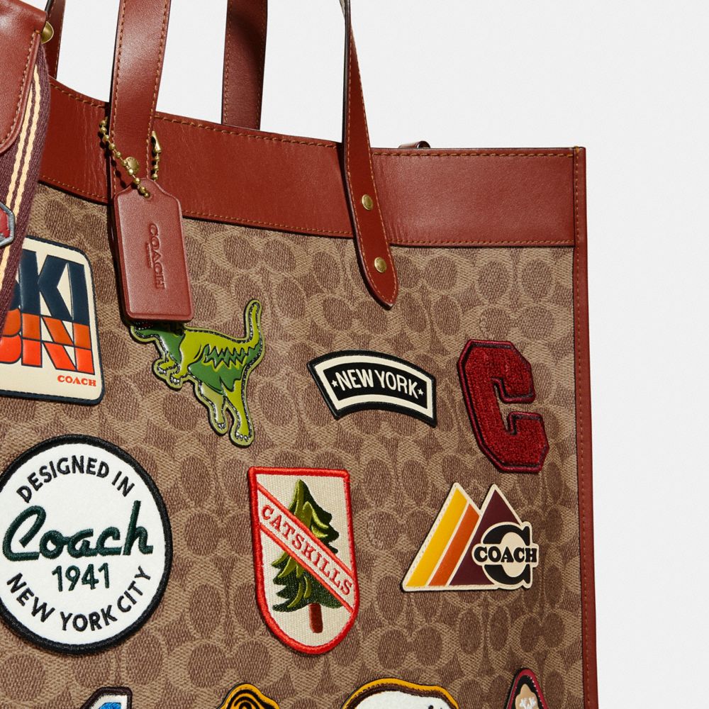 Field Tote 40 In Signature Canvas With Patches | COACH®