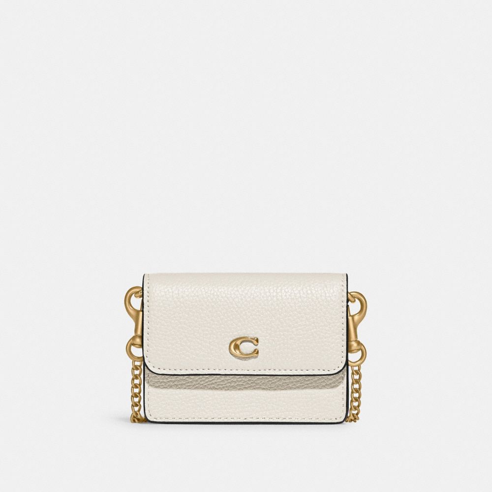 coach half flap signature card case tan rust