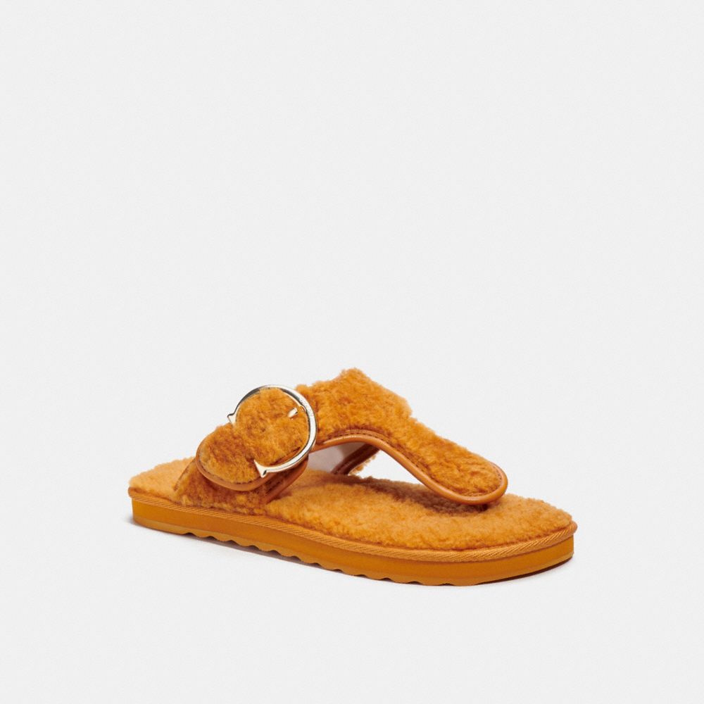 yellow coach flip flops