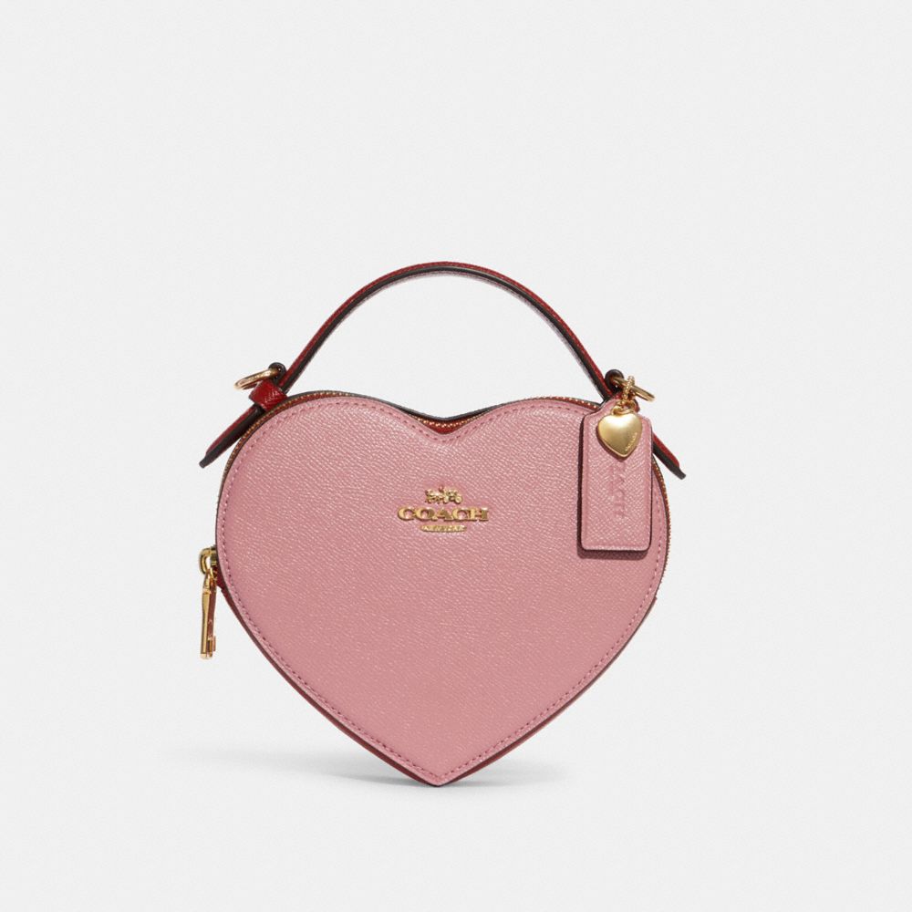 Arriba 44+ imagen pink coach purse outlet