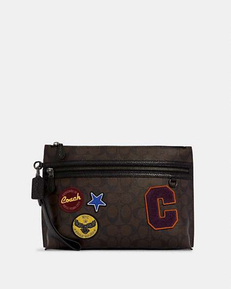 Carry All Pouch In Signature Canvas With Souvenir Patches