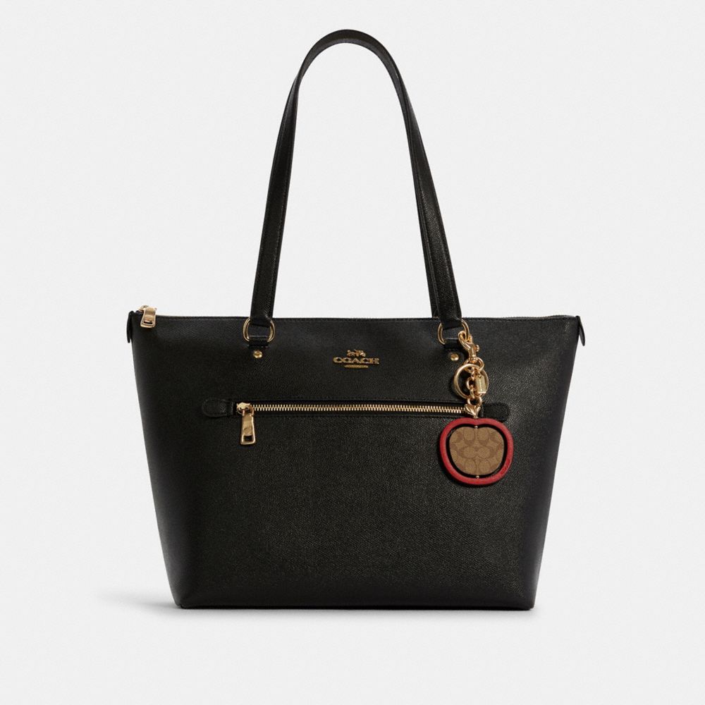 COACH® Spinning Apple Bag Charm In Signature Canvas