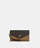 COACH®,TRAVEL ENVELOPE WALLET IN BLOCKED SIGNATURE CANVAS,Signature Coated Canvas,Gold/Khaki Brown Multi,Front View