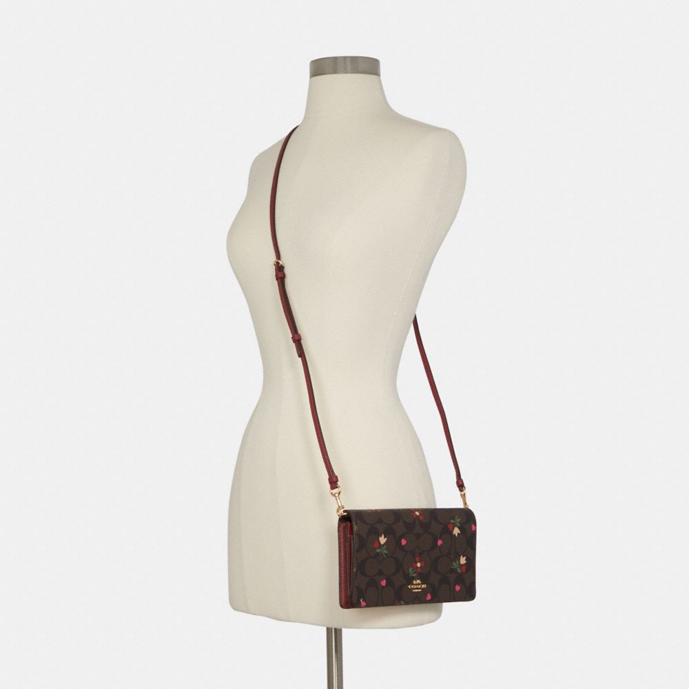 boxed anna foldover crossbody clutch in signature canvas