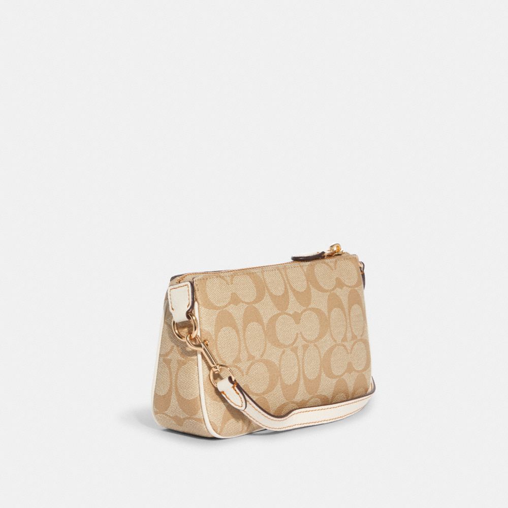 COACH® | Nolita 19 In Signature Canvas With Tiger