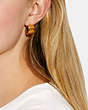 COACH®,SIGNATURE ENAMEL HUGGIE EARRINGS,Brass,Gold/Yellow,Detail View