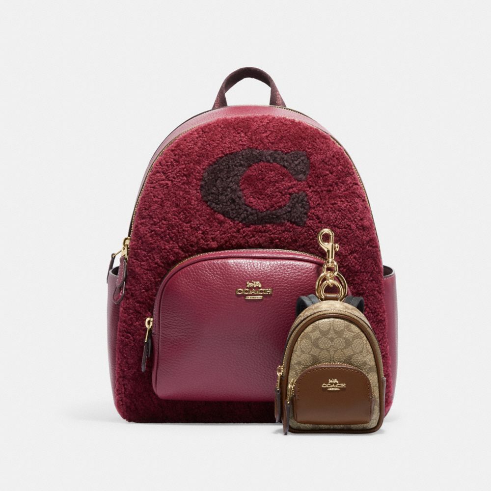 COACH® Mini Court Backpack Bag Charm In Signature Canvas