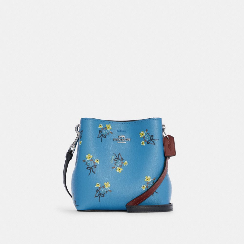 Introducir 52+ imagen coach blue flower purse