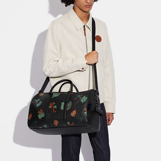 COACH® | Venturer Bag With Dreamy Leaves Print