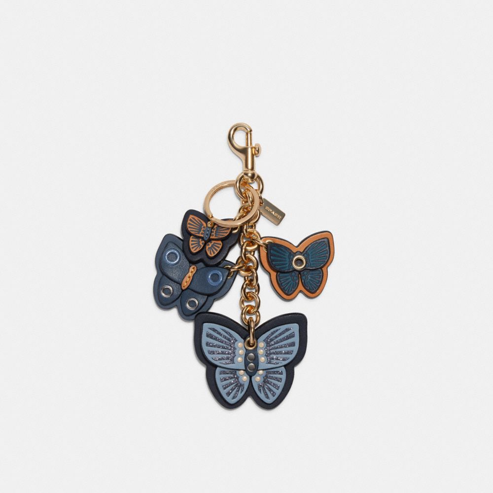 Total 48+ imagen coach butterfly cluster bag charm