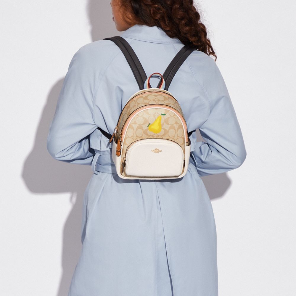 COACH® Mini Court Backpack In Signature Canvas With Pear