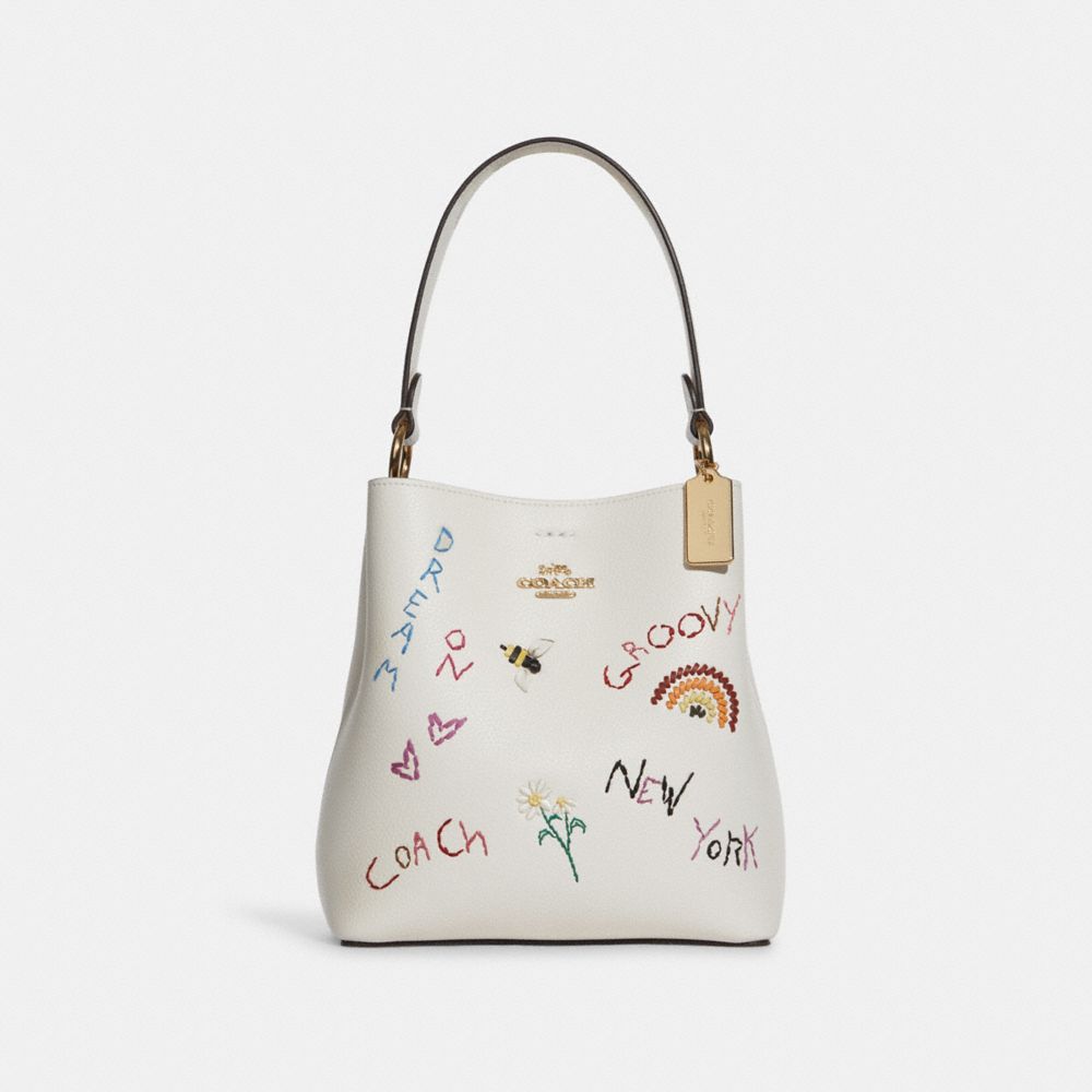 COACH®,Small Town Bucket Bag With Diary Embroidery,,Front View