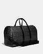 COACH®,GOTHAM DUFFLE IN SIGNATURE CANVAS,Signature Coated Canvas,Large,Black Copper/Charcoal,Angle View