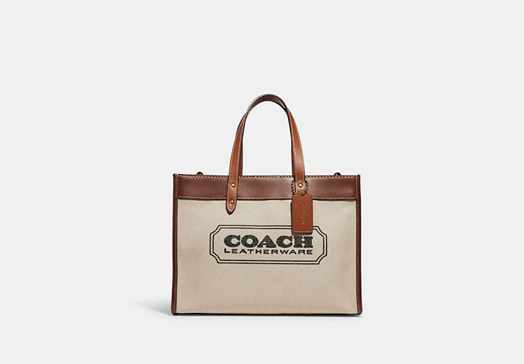 COACH®,FIELD TOTE 30 WITH COACH BADGE,Brass/Dark Natural Multi,Front View