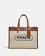 COACH®,FIELD TOTE 30 WITH COACH BADGE,Brass/Dark Natural Multi,Front View