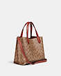 COACH®,WILLOW TOTE 24 IN SIGNATURE CANVAS,Signature Coated Canvas,Medium,Brass/Tan/Rust,Angle View