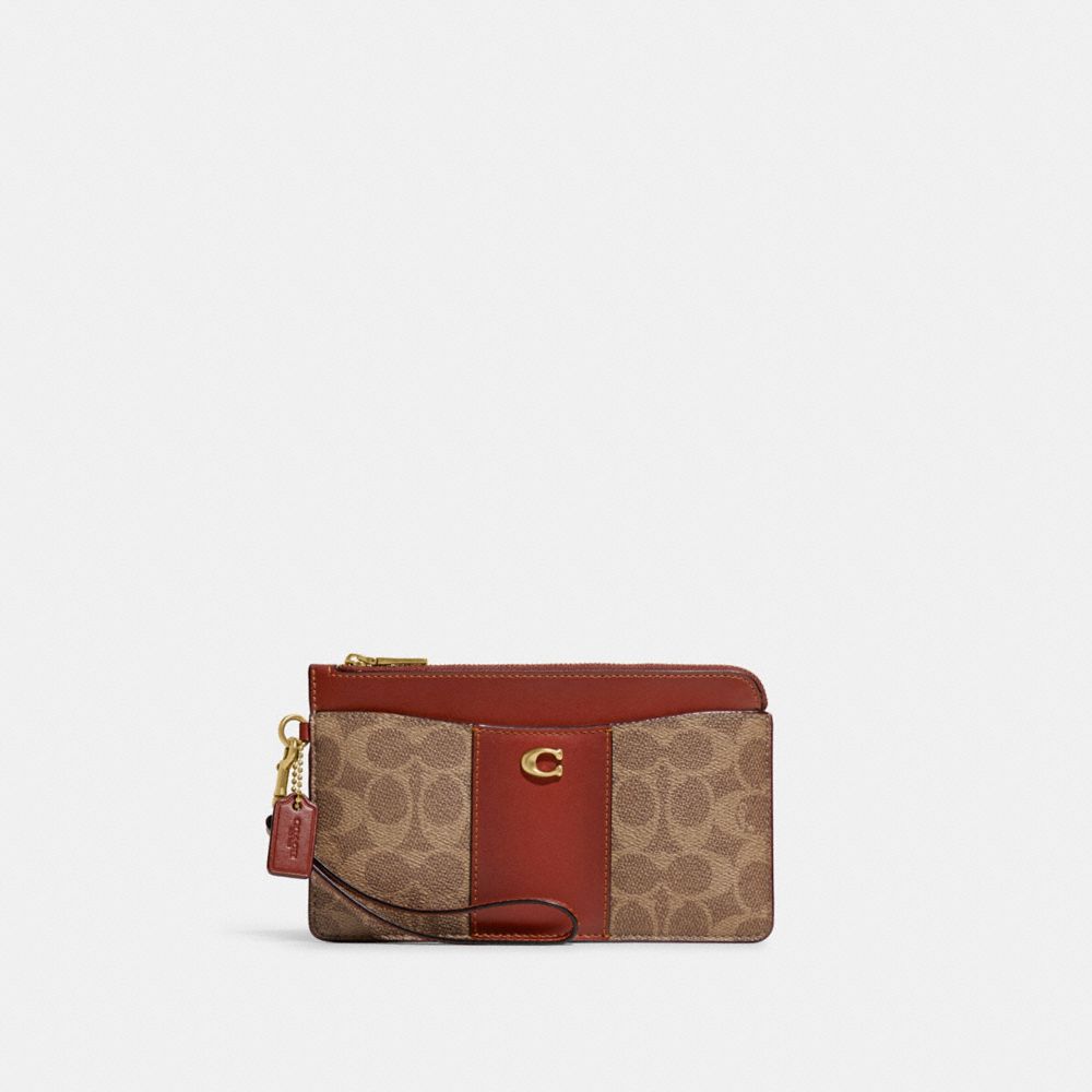 Coach L Zip Wristlet In Signature Canvas In Brass/tan/rust ModeSens