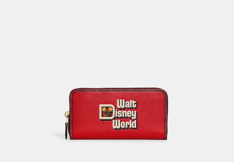 COACH®,DISNEY X COACH ACCORDION ZIP WALLET WITH WALT DISNEY WORLD MOTIF,Polished Pebble Leather,Brass/Electric Red Multi,Front View