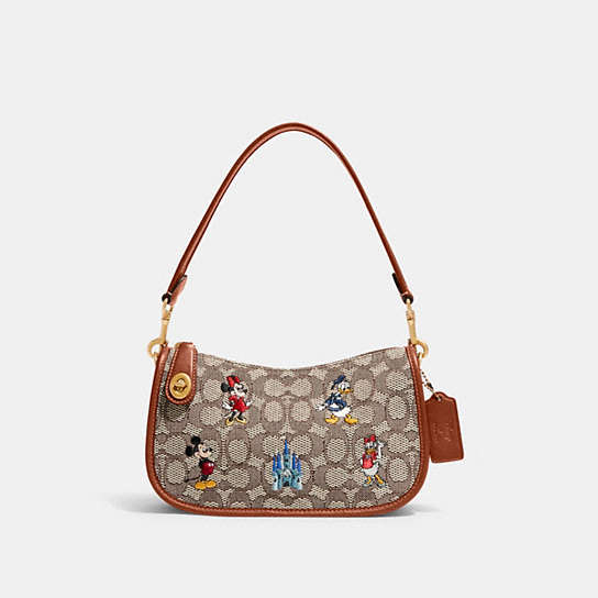 COACH® | Disney X Coach Swinger Bag In Signature Textile Jacquard With  Mickey Mouse And Friends Embroidery