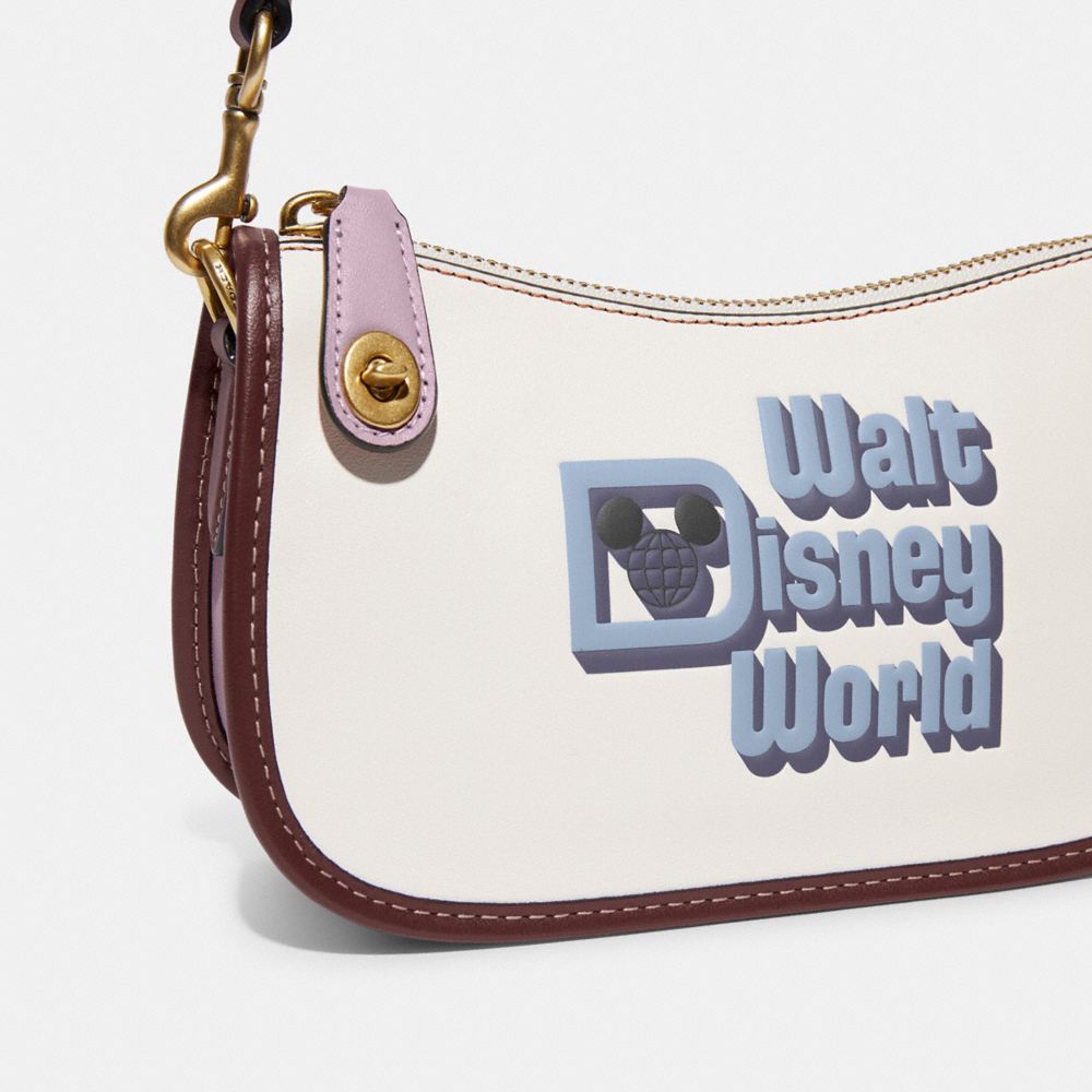 COACH® | Disney X Coach Swinger 20 With Walt Disney World Motif