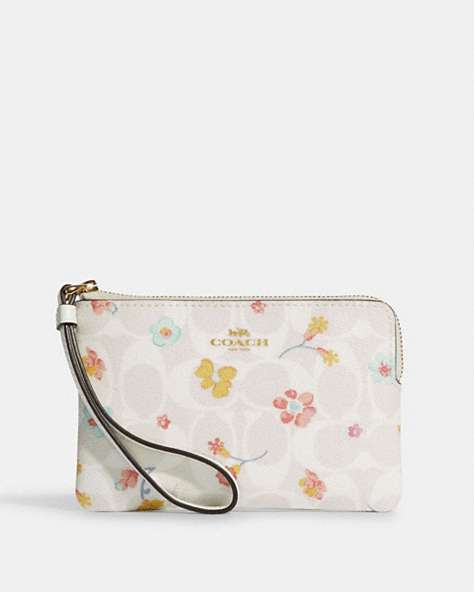 Corner Zip Wristlet In Signature Canvas With Mystical Floral Print