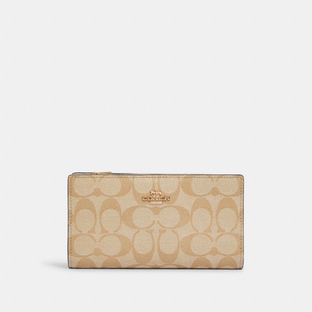 COACH® Slim Zip Wallet In Signature Canvas