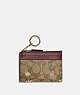 COACH®,MINI SKINNY ID CASE IN SIGNATURE CANVAS WITH WILDFLOWER PRINT,Coated Canvas/Leather,Mini,Gold/Khaki Multi,Front View