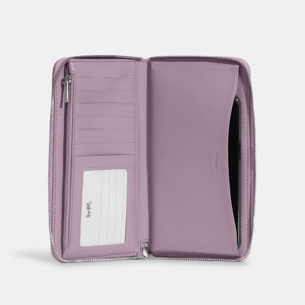 Dempsey Large Phone Wallet In Signature Jacquard With Stripe And Coach Patch