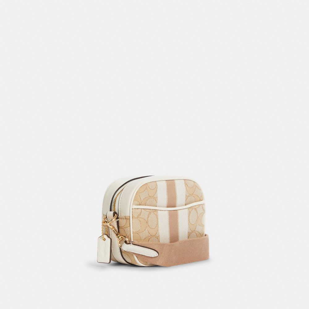 COACH®,Mini Dempsey Camera Bag In Signature Jacquard With Stripe And Coach Patch,,Angle View