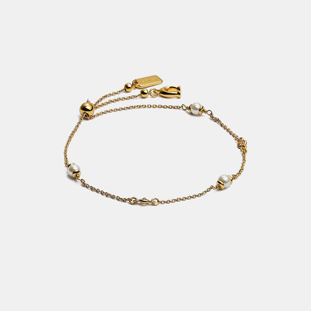 Coach Classic Crystal Pearl Slider Bracelet In Gold