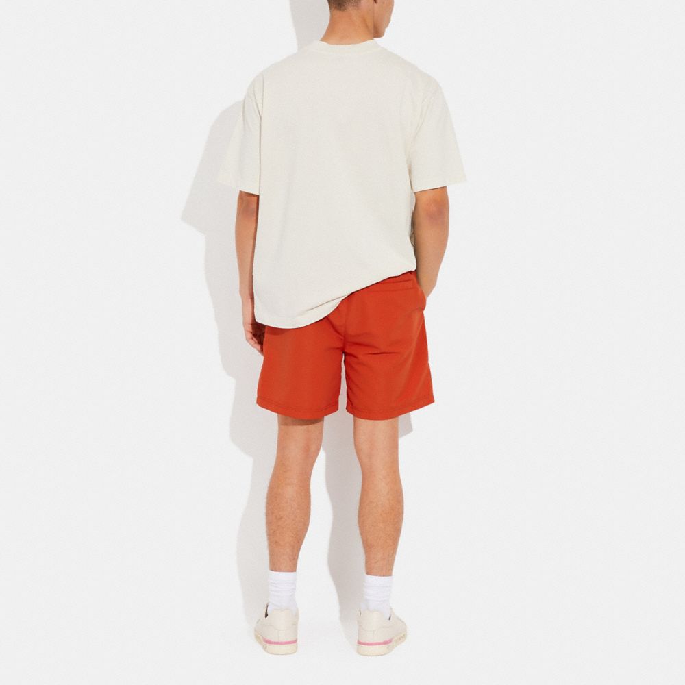COACH®,MAGIC PRINT SIGNATURE SWIM TRUNKS,Polyester,Deep Orange,Scale View