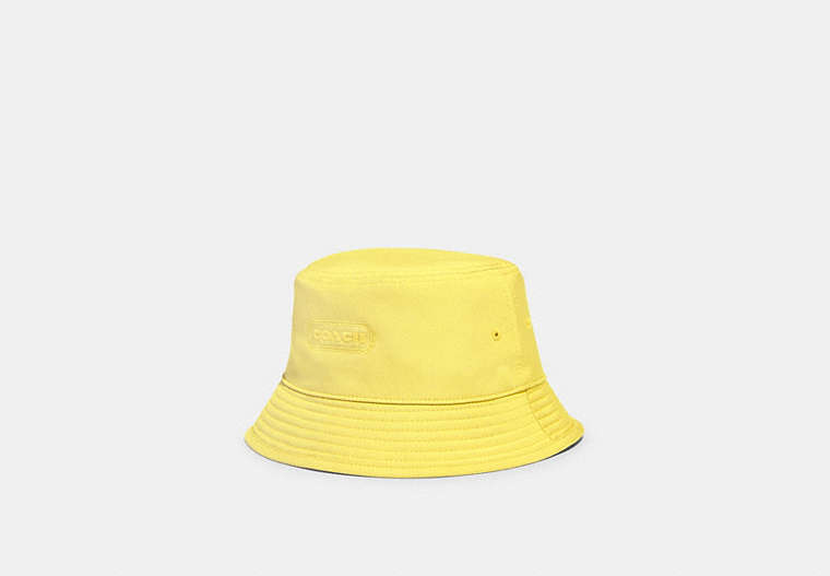 COACH®,REVERSIBLE SIGNATURE NYLON BUCKET HAT,Polyester,Yellow,Front View