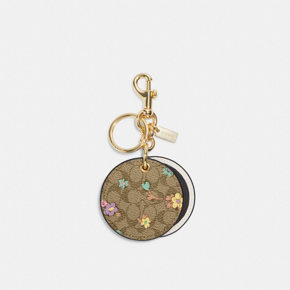 COACH OUTLET® | Mirror Bag Charm In Signature Canvas With Spaced Floral ...
