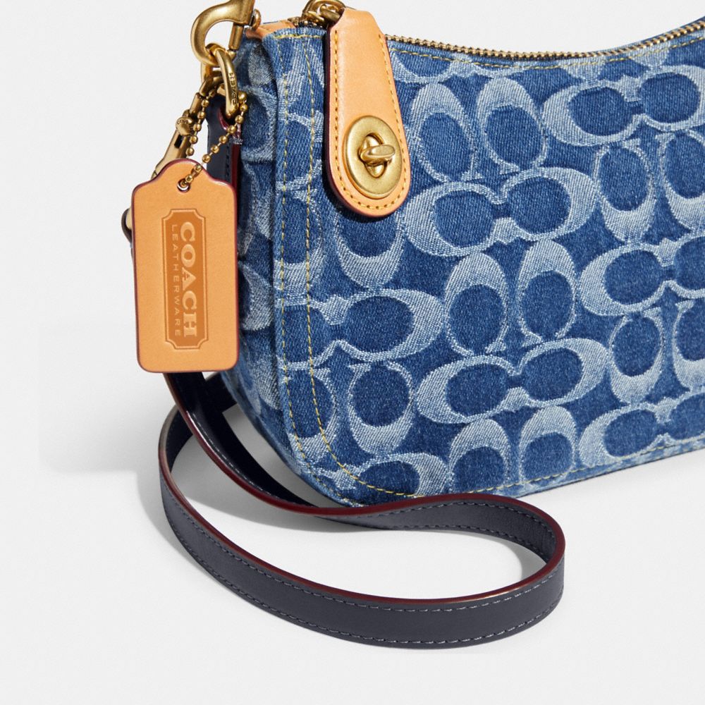 COACH® | Swinger In Signature Denim