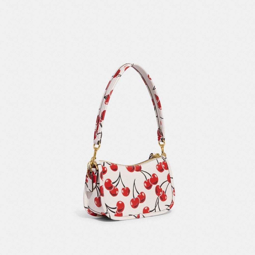 COACH® | Swinger 20 With Cherry Print