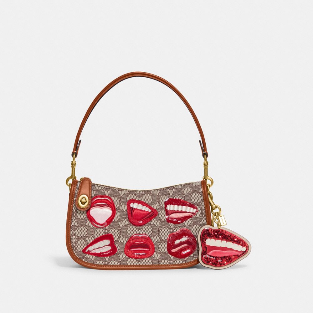 Introducir 103+ imagen coach bag with lips