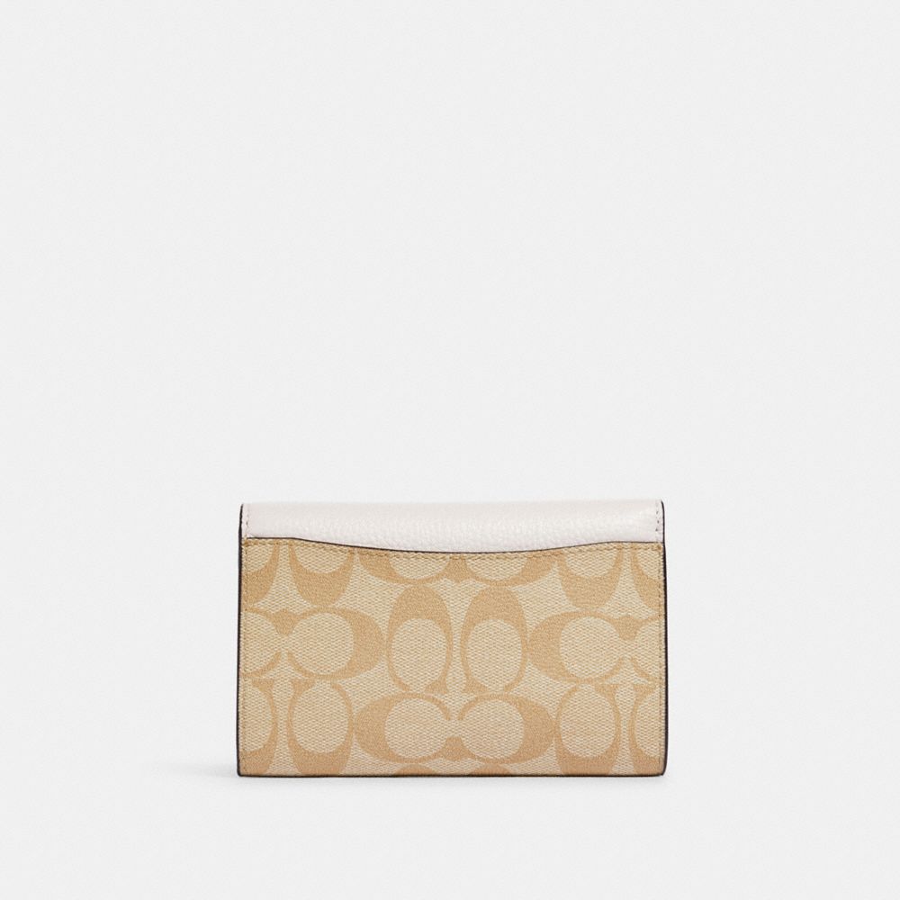 COACH OUTLET® | Kleo Wallet In Blocked Signature Canvas