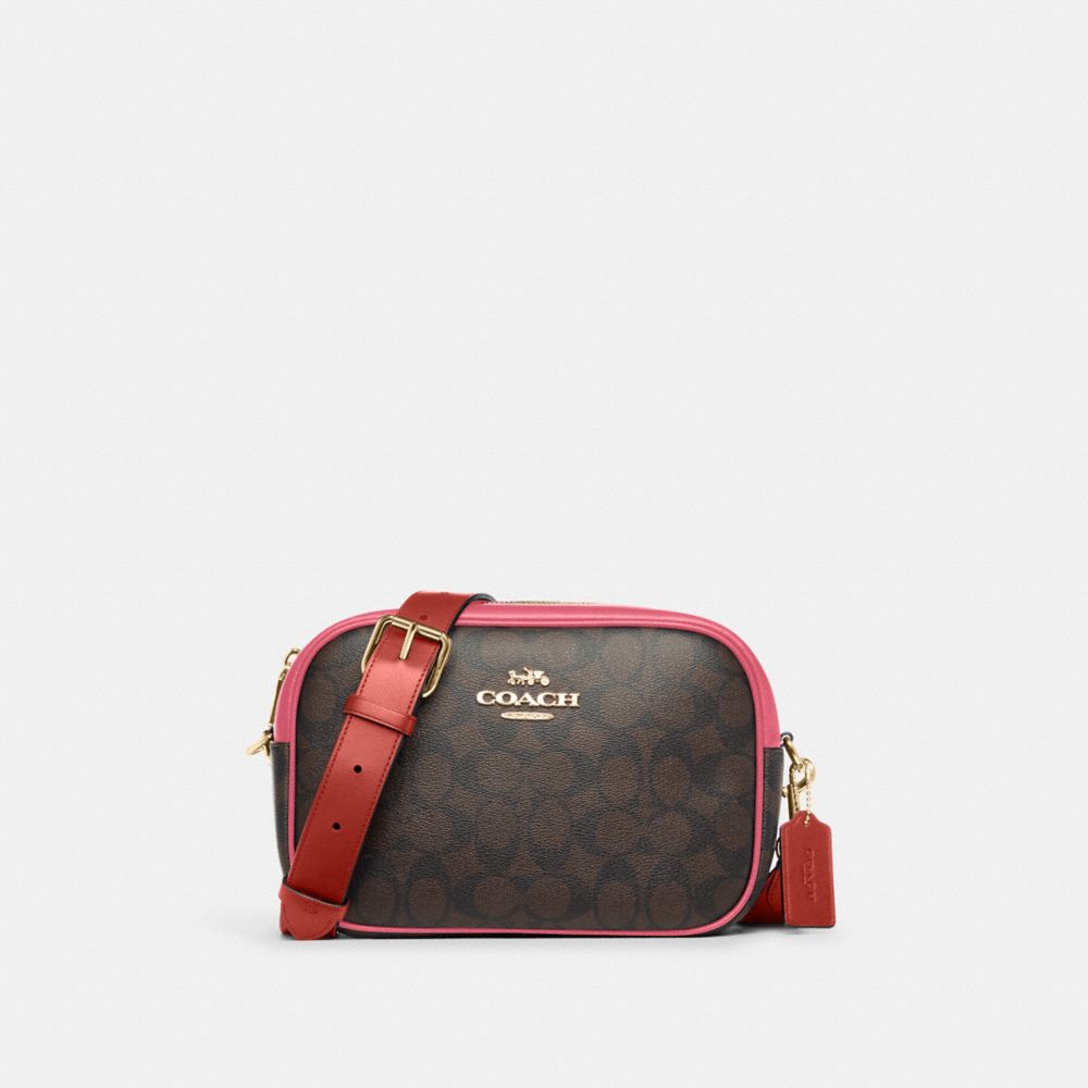 COACH Jes Crossbody Bag In Signature Canvas In Pink Lyst atelieryuwa