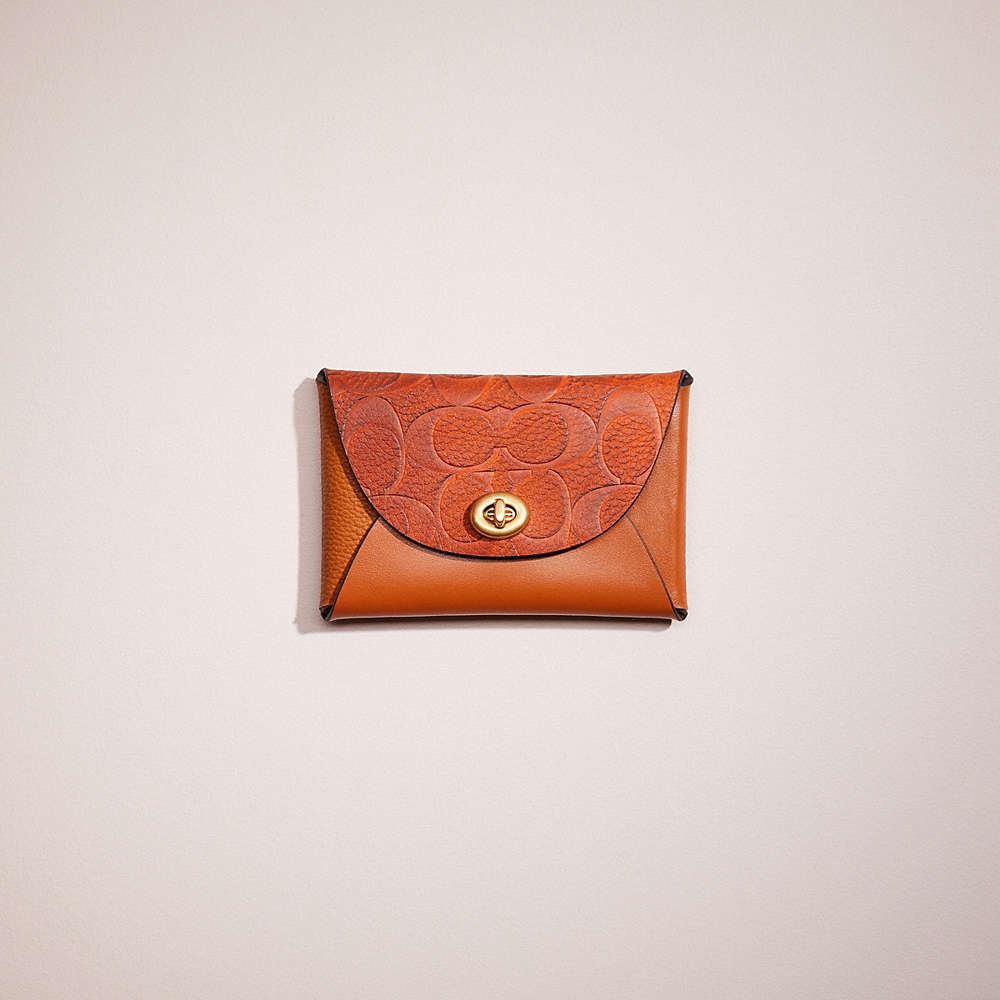 Coach Remade Colorblock Medium Pouch In Papaya