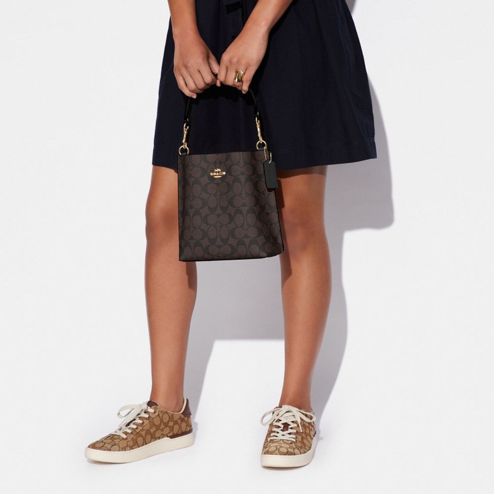 COACH OUTLET®  Mollie Bucket Bag In Signature Canvas