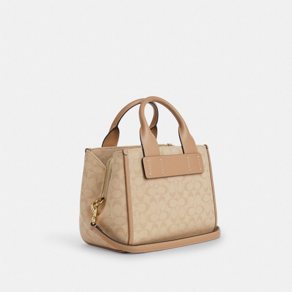 COACH®,Carly Carryall Bag With Signature Canvas,,Angle View
