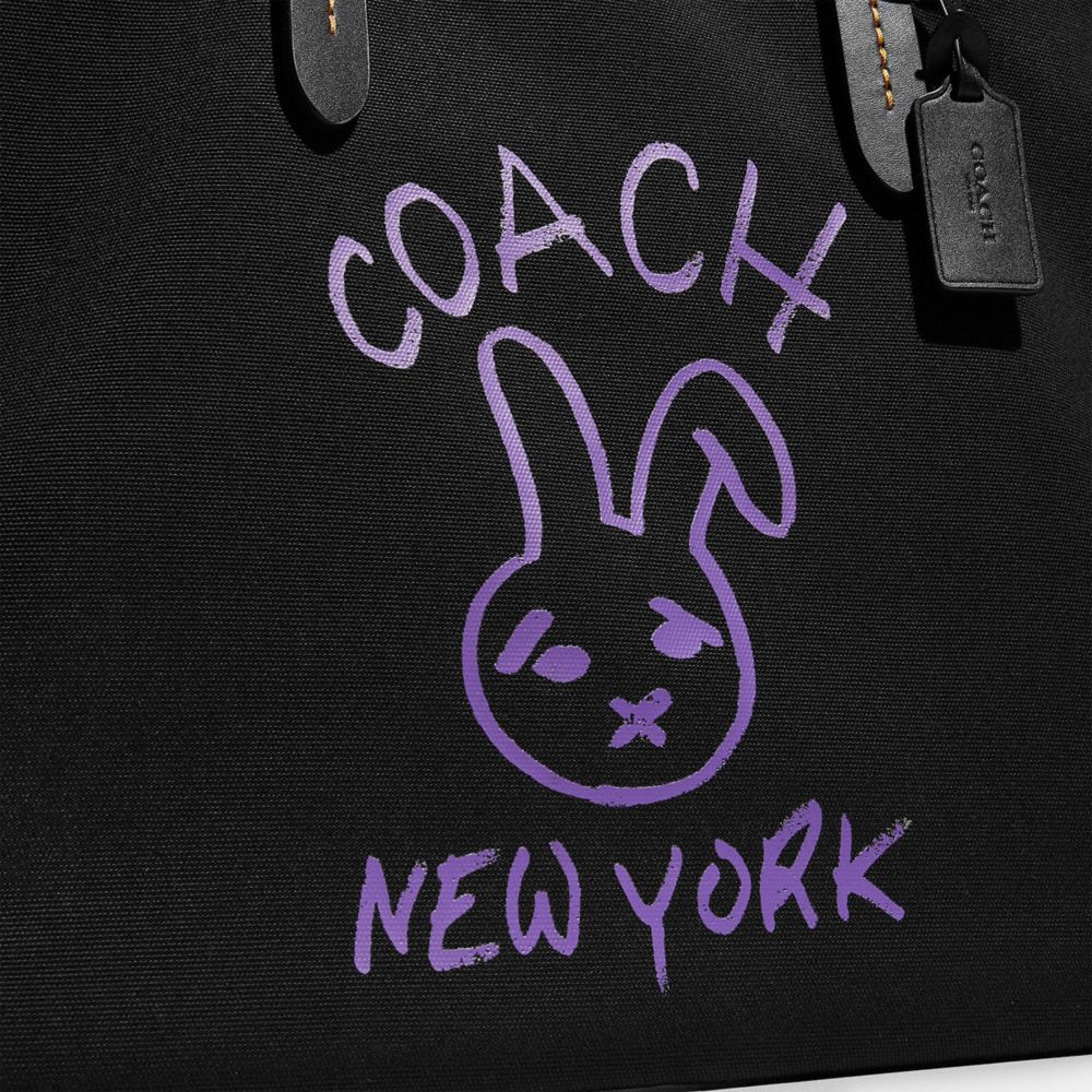 COACH® | Tote 42 In 100 Percent Recycled Canvas With Bunny Graphic