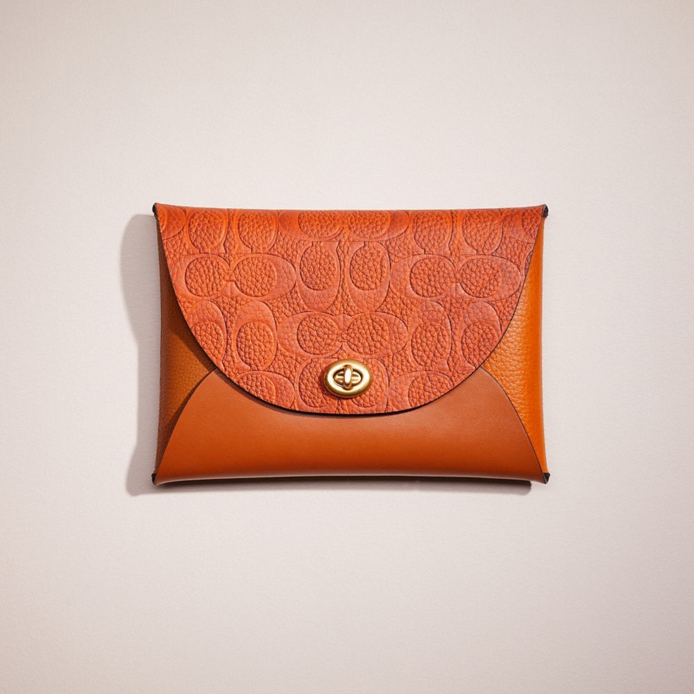 Coach Remade Colorblock Large Pouch In Papaya