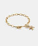 COACH®,PAVÉ REXY SIGNATURE CHAIN BRACELET,Plated Brass,Rexy,Gold/Crystal,Front View