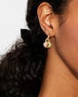 Pavé Turnlock Huggie Earrings